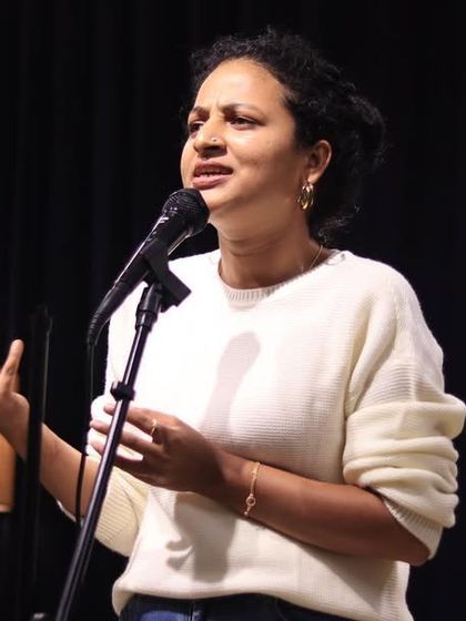 A storyteller passionately narrating a tale at our Kannada open mic.