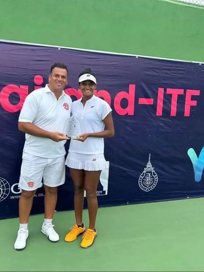 Our coach stands proudly with Sahaja after her successful run to the finals in the Thailand ITF 25k tournament.