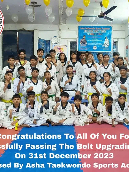 A large group photo celebrating everyone who passed the belt upgrading test. The entire academy celebrates these achievements together.