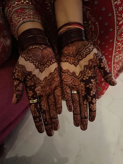 The rich, dark stain of a Karwachauth mehendi. This is the beautiful result you get with my homemade, natural henna paste.