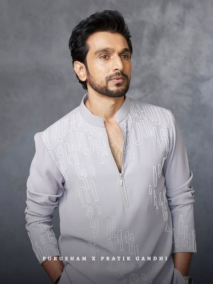 Another look at Pratik Gandhi in this sharp, modern kurta. It is an ensemble that perfectly balances contemporary design with an irresistible, classic charm.