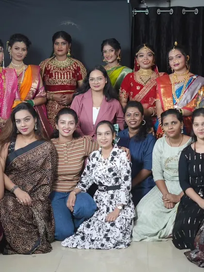 A group photo with my talented students and their beautifully styled models after a successful portfolio day at the academy.