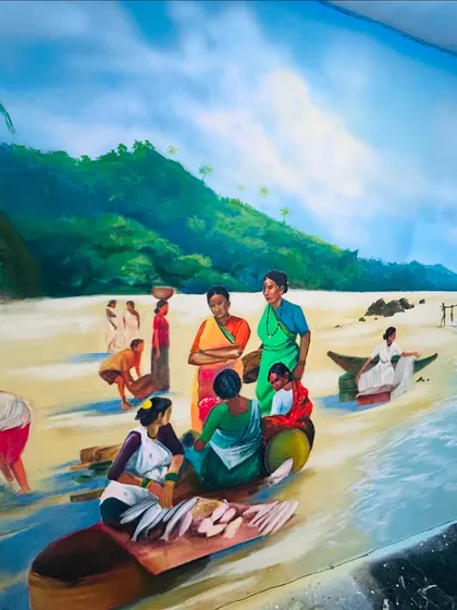 This part of the mural captures the community aspect of Aagri Koli life. I used vibrant colors to depict the traditional attire and the lively atmosphere of the seashore.