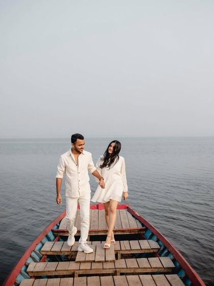 There's nothing more serene than being on the water. We took a boat out on Pawna Lake for this shoot, capturing the couple as they walked on the boat, surrounded by calm.