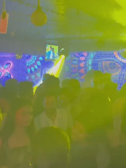 The party in full swing during a Casino Royale themed night. The energy is electric.