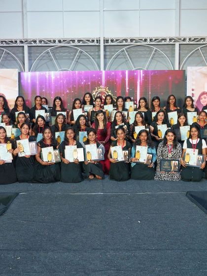 A group photo of my 14th batch of graduates, all holding their certificates and ready to start their careers.