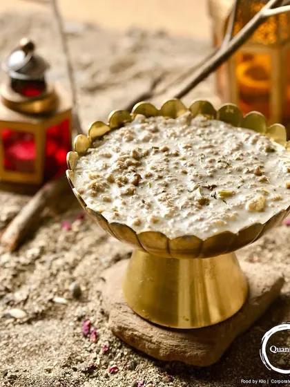 Another look at the Mutton Irani Keema, showcasing its presentation with rustic props that evoke a sense of tradition and authenticity.