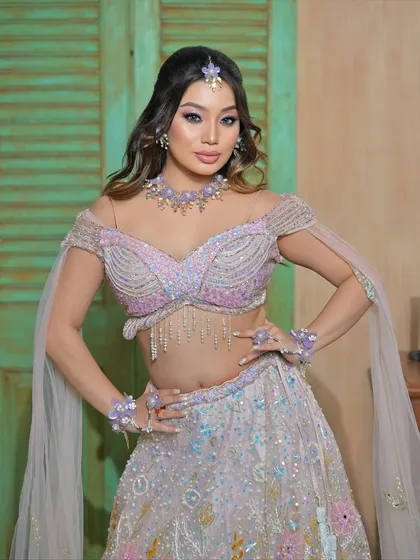 This is for your fun pre-wedding functions. My floral jewellery collection, like this whimsical lilac set, is perfect for a Haldi or Mehendi ceremony. It's lightweight, fresh, and designed to make your photos pop with color and joy.