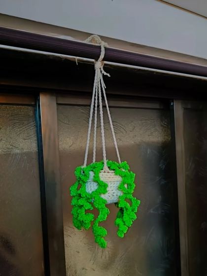 A look back at some of my 2024 creations, including this cute little hanging plant. It was a magical year of creating new things with a hook and yarn.