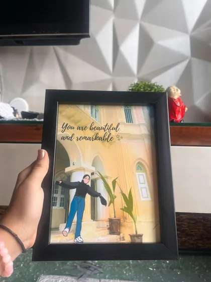 Another view of this beautiful illustrated solo portrait, this time in a classic black frame. The custom quote makes it a truly personal and encouraging piece of decor for any room.
