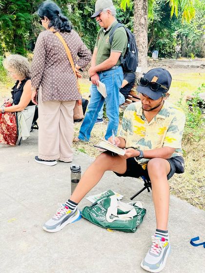 Another photo of me sketching on location in Nagpur, enjoying the creative atmosphere.