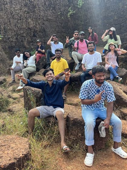 Happy faces and peace signs from our group during a break on the Gokarna beach trek.
