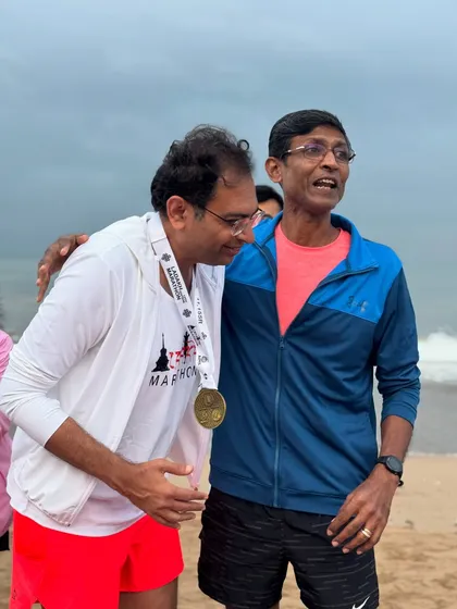 A moment of joy and relief after the Ladakh Half Marathon. The bond between coach and athlete is at the heart of our community.