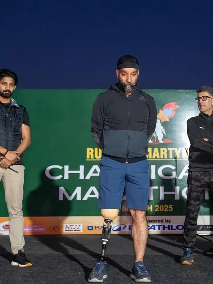 Standing with Major D.P. Singh, a true inspiration, at the 'Run for Martyrs' event. My events are often dedicated to a greater cause, honoring our heroes and supporting our community. This is what I mean by running with 'jajba' or passion.