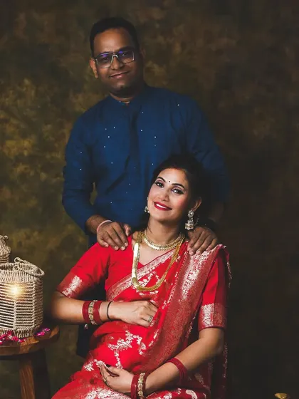 Celebrating traditions is very important to me. This maternity portrait showcases a beautiful mother-to-be in a traditional red saree, creating a rich and culturally significant image. I can style your session to reflect your personal heritage and style.