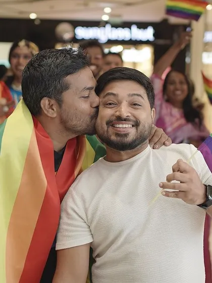 This is us, Ankur and Deepak, sharing a happy moment during a Pride walk. Our kitchen is built on love, and we're so proud to share that with our community.