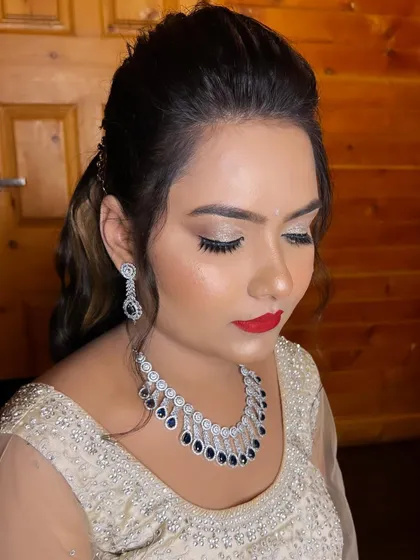 The complete Sangeet look is elegant and party-ready, ensuring the client feels confident and beautiful all night long.