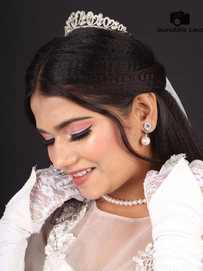 A final close-up of this lovely Christian bridal makeup. The focus is on enhancing her natural beauty with soft colours and a dewy finish.