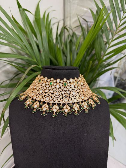 A direct, clear shot of the Kundan floral motif choker on a bust, allowing you to see all the details before you decide to rent.