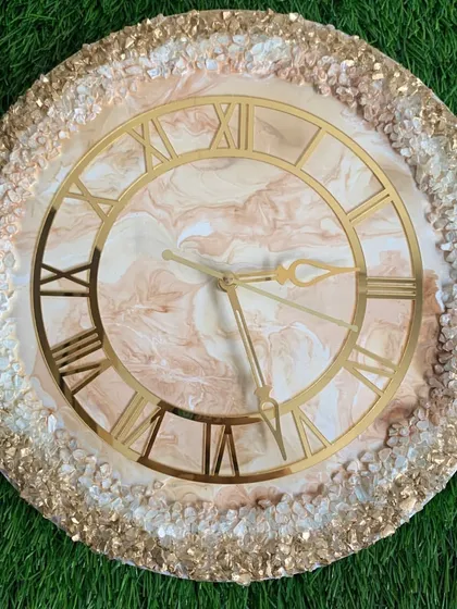 This clock features a beautiful blend of earthy tones with a full border of sparkling crystals.