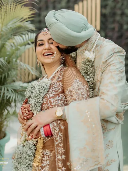 The raw emotion of a Sikh wedding. This candid embrace after the Anand Karaj ceremony speaks volumes, capturing a moment of pure happiness and connection that is both personal and profound.