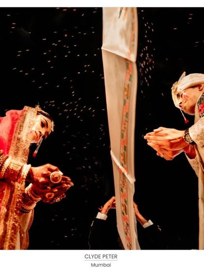 A Fearless Award-winning photo from a Hindu ceremony, capturing the ritual from a low angle to create a unique and powerful perspective.