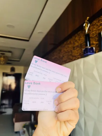 These "Love Bank" wallet cards are a cute and playful gift for couples. They are designed to look like credit cards but are filled with love and affection.