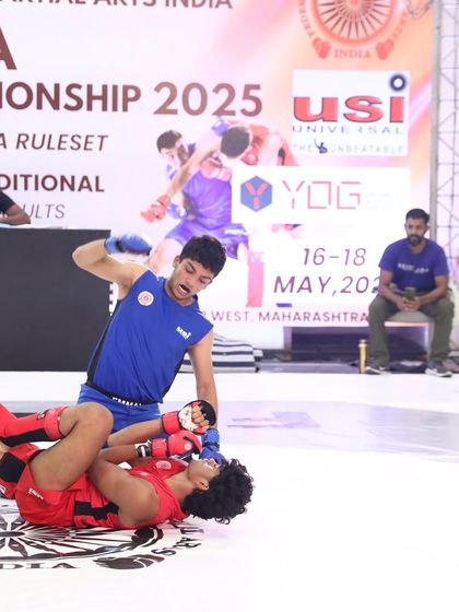 Ground and pound to secure the win. This shot from the FMAAI Nationals captures the intensity and finishing instincts we drill in our training.