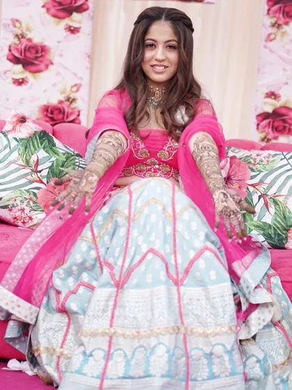 Showing off her beautiful mehendi. I created a soft and pretty makeup look for her, keeping it fresh and radiant for her daytime ceremony.