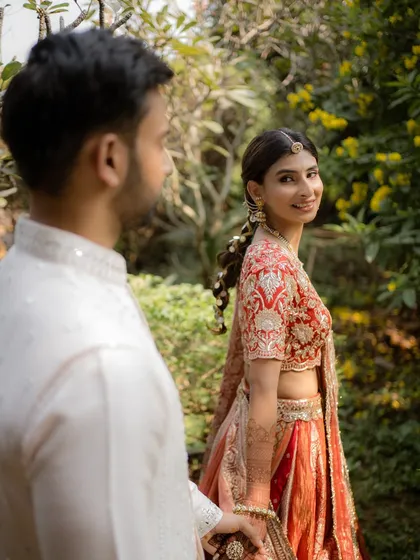 A romantic shot from Yashvi's Mayera ceremony. Her makeup is traditional yet fresh, with defined eyes and a natural lip color.