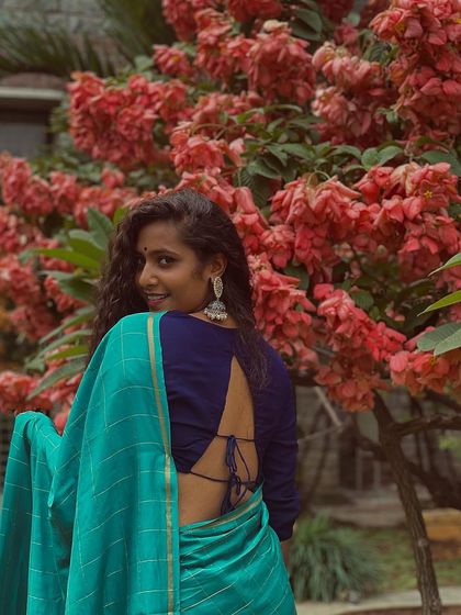A playful pose in a beautiful blue saree. I love how a simple garment can reflect a mood and a moment.