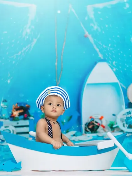 I'm not messy, I'm just creatively organized! A thoughtful moment from our nautical-themed studio photoshoot.