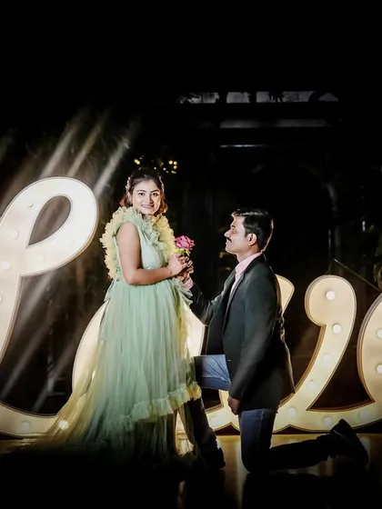 My gowns are perfect for creative pre-wedding concepts. This couple used a light green ruffled dress for their romantic shoot with a large "LOVE" marquee, creating a fun and stylish photo.