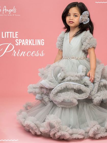 A little sparkling princess in our Luna Grey gown, a perfect choice for a pageant or grand event.