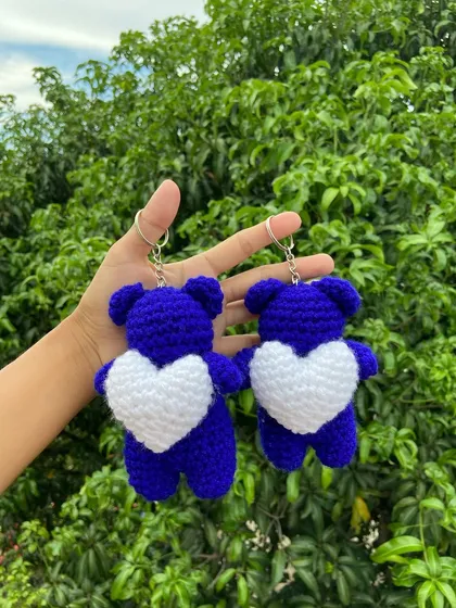 A close-up of the custom blue bear keychains with white hearts. I can create these in any color combination you need for your business.