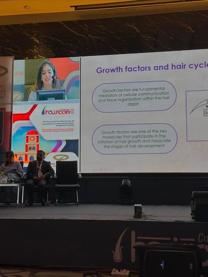 Discussing the intricate details of the hair growth cycle and the role of growth factors. This deep scientific understanding informs every treatment plan I create.