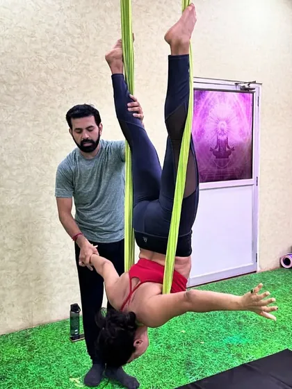 You are always supported here. I provide hands-on guidance, especially for beginners, to ensure you feel safe and confident as you learn to trust the hammock and explore new movements like this supported inversion.