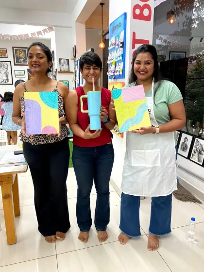 Three friends with their abstract texture paintings. It's a fun and expressive art form that doesn't require any prior experience.