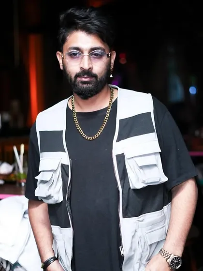 A candid shot, looking cool and collected during a Saturday night set.