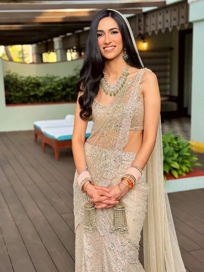 A happy and radiant bride on her wedding day. Her minimalist makeup enhances her natural beauty and her joyful smile, creating a look that is effortlessly chic.
