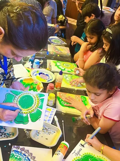 A wonderful moment from a birthday party where kids and adults are completely focused on their mandala art projects. I guide everyone step by step, so all your guests can feel like true artists.