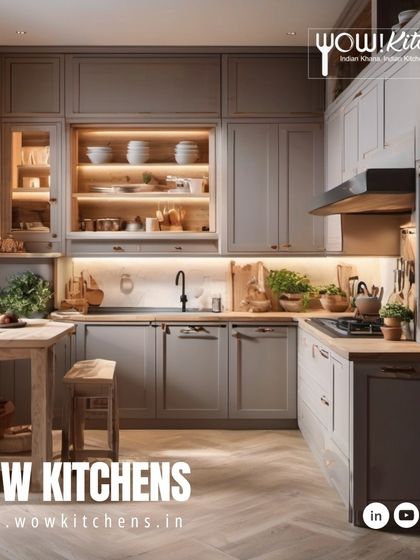 Even compact spaces can be clever. This classic L-shaped kitchen uses warm grey shaker cabinets and wood countertops to create a cozy, rustic feel that is both charming and functional.