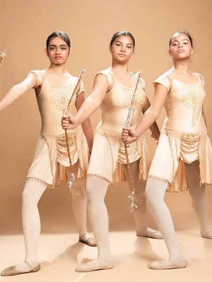 These studio portraits capture the warrior spirit of our dancers performing a piece inspired by the ballet 'Sylvia.' Holding their bows, they embody a story of conflict, courage, and resolution.