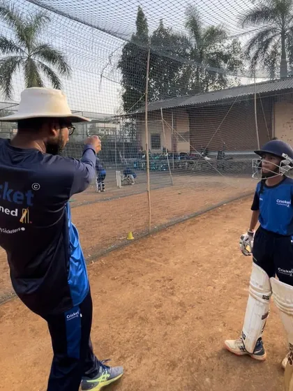 A personal coaching moment with Aayush. This one-on-one guidance is crucial for preparing players for major tournaments like the Payyade Trophy.