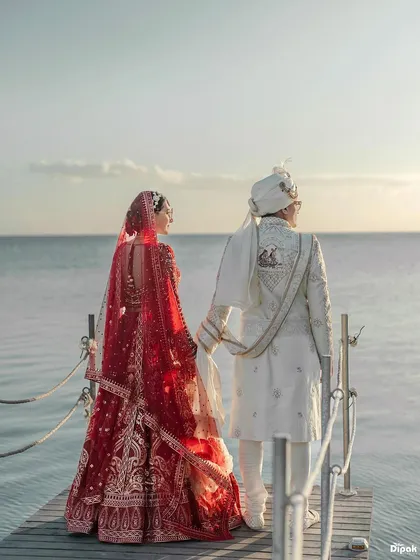 A quiet promise made against the endless horizon of Mauritius. My work often takes me to the world's most beautiful shores, where I capture love stories like this one at the Hilton Mauritius. This is for couples who dream of a destination wedding, blending the serenity of nature with the sanctity of their vows.