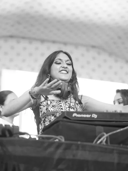 Feeling the music with my eyes closed. A passionate moment captured in black and white during a high-energy Garba set.
