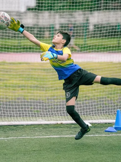 The last line of defense. We train our goalkeepers to be fearless, agile, and decisive, making them a crucial part of the team's success.