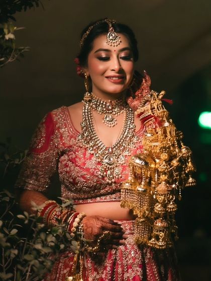 A modern bride with a traditional twist. Her smile says it all. The makeup is fresh and radiant, letting her happiness be the centerpiece.