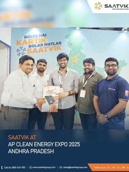 Our team celebrating a successful interaction at the AP Clean Energy Expo, with our "Bolta Hai Kartik" campaign in the background.