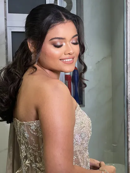 A candid shot showing the soft movement of the hair. This style is perfect for someone who wants to look polished yet feel comfortable.